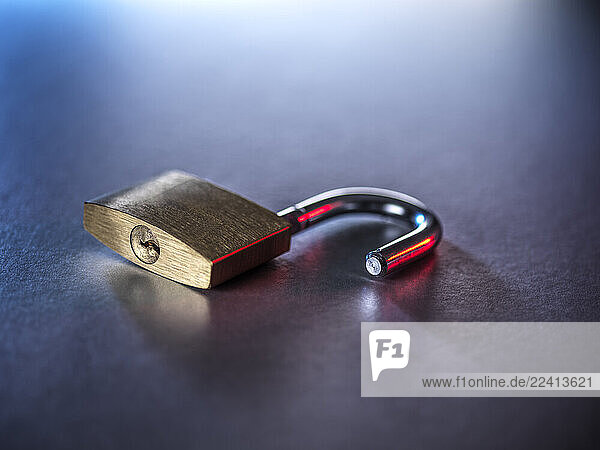 Unlocked padlock symbolizing cyber security and access vulnerability