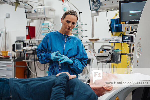 Doctor consulting with patient in an emergency room setting