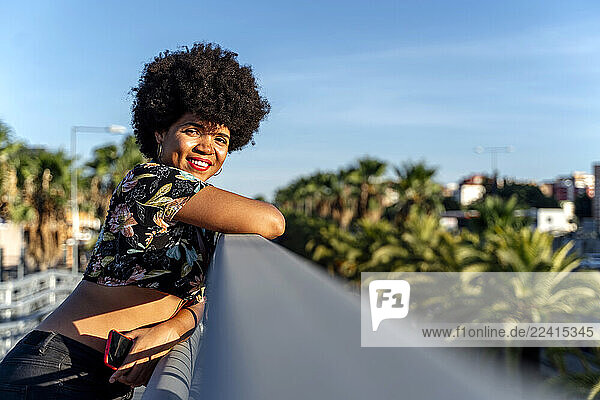 Female Afro-American with smartphone
