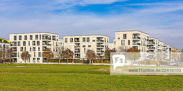 Modern apartment buildings in Ostfildern  Germany with green space and clear sky