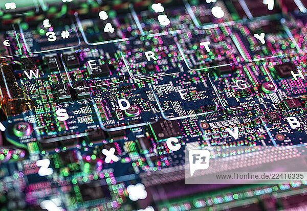 Close-up of a colorful circuit board and keyboard representing technology and artificial intelligence