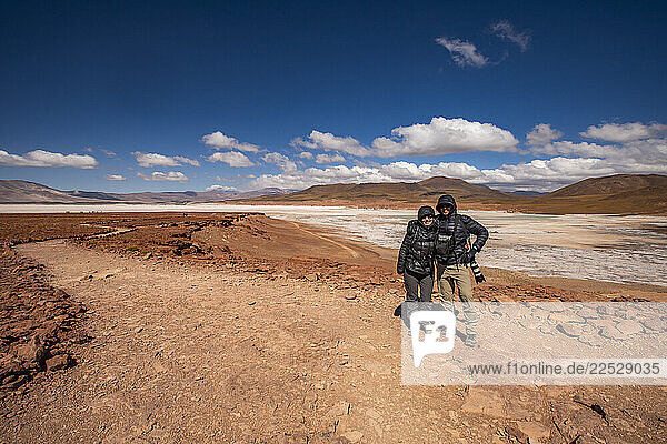 Portrait of smiling senior couple standing in Atacama Desert