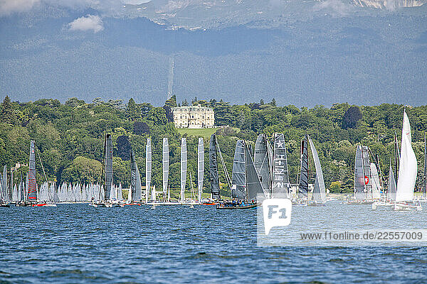 Yachts racing during the Bol d’Or Mirabaud with the snow on the French Alps in the background.
The Bol d’Or Mirabaud is the most important inland lake regatta in the world. Started in 1939  it welcomes mono-hulls and multihulls each year on Lake Geneva  starting in Geneva  Switzerland. More than 500 boats encounter each other on this 123 kilometer (66.5 nautical miles) course from Geneva to Le Bouveret and back