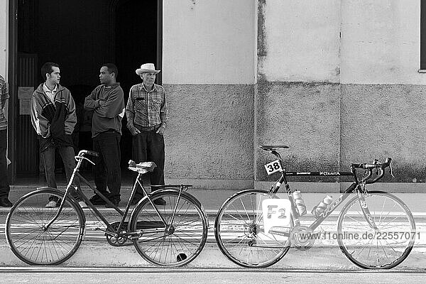 A race bike stands in stark contrast to a local commuter in Ciego de Ávila.