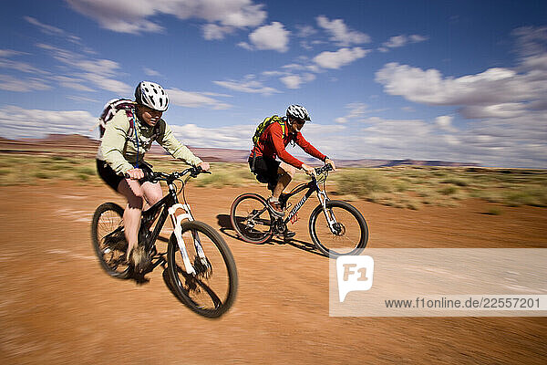 Mountain bikers Brad Barlage and Katie Caviccio ride the White Rim Trail in Canyonlands National Park  Southern Utah.
