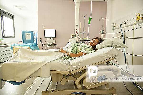 A woman waiting to give birth in the hospital delivery room Mom: Éléonore Dad Christophe  Lorient  Brittany  France.