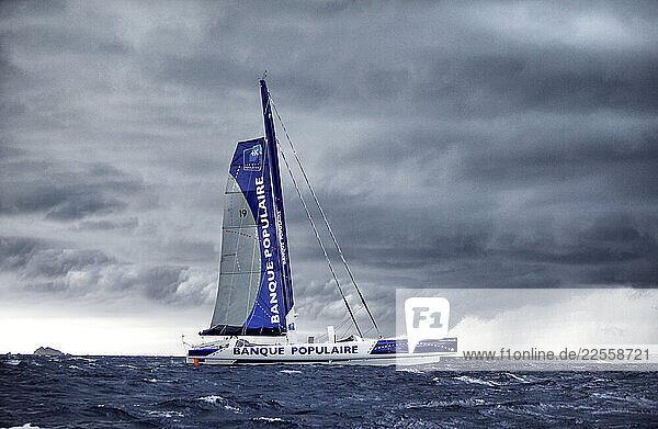 Armel Le ClÃ©acâ€™h and the Maxi Trimaran Solo Banque Populaire VII Trans at the start of the record attempt Marseille â€“ Carthage.