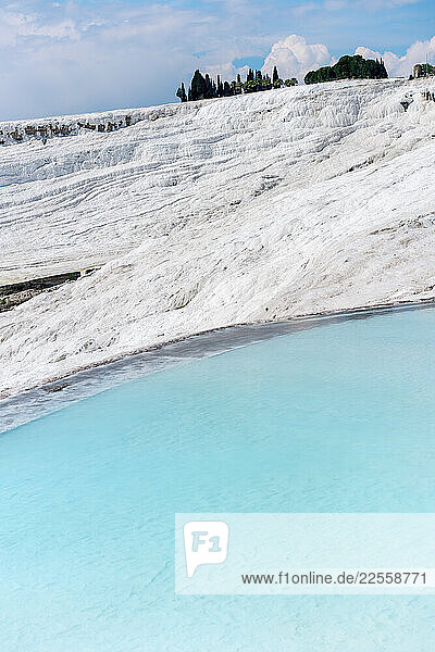 Pamukkale travertines filled with turquoise hot spring water
