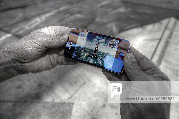 Hands holding phone
