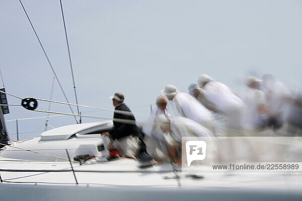 Crew training on racing sailing yacht.
