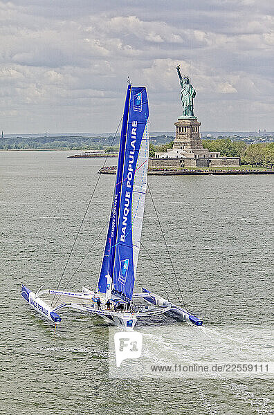 Armel Le Cléac h and the Maxi Trimaran Solo Banque Populaire VII on stand by for the multihull North Atlantic solo record attempt New York Manhattan United States of America.