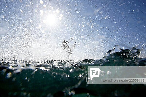 Kite Surfer Mayeul Riffet in action on a foiling kiteboard Lorient Brittany France.