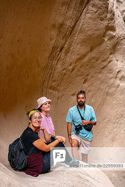 Tourist friends exploring Avla canyon in Soganli