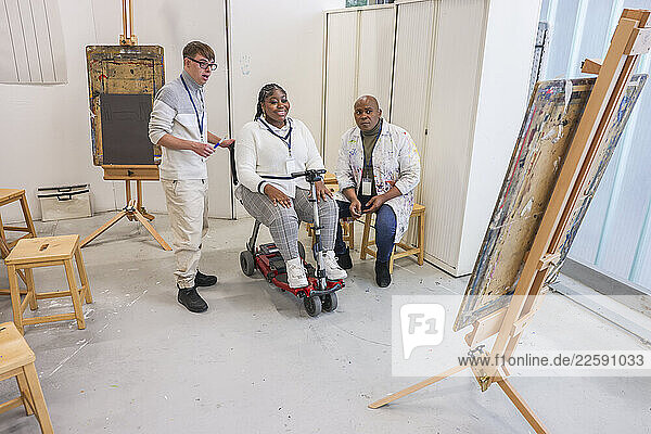 Disabled people talking in workshop