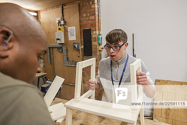 Disabled men working in workshop