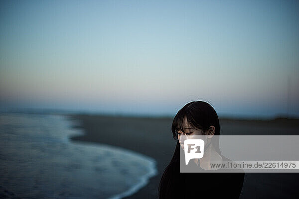Young Japanese woman at the beach