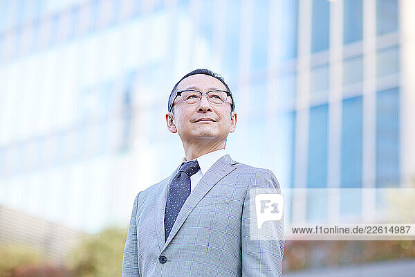 Japanese businessman outside