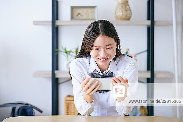 Japanese schoolgirl at home