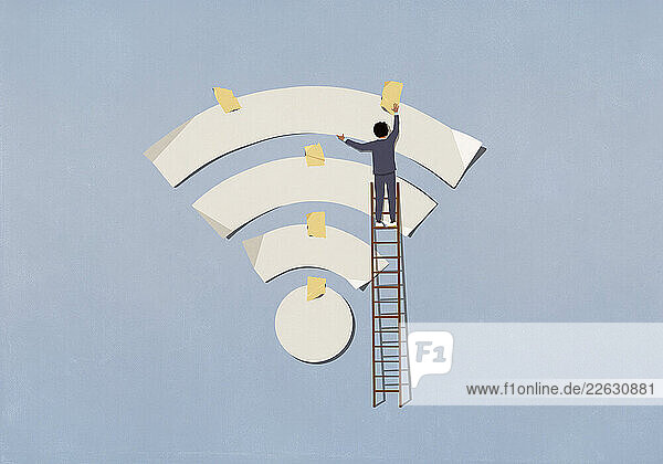 Businessman on ladder taping Wi-Fi symbol to blue background