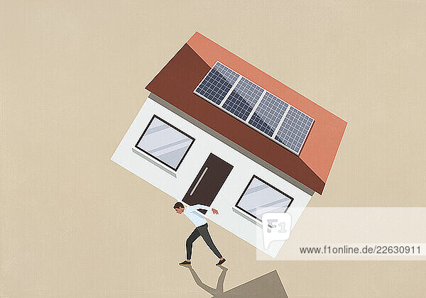 Man carrying large  heavy house with solar panels on back