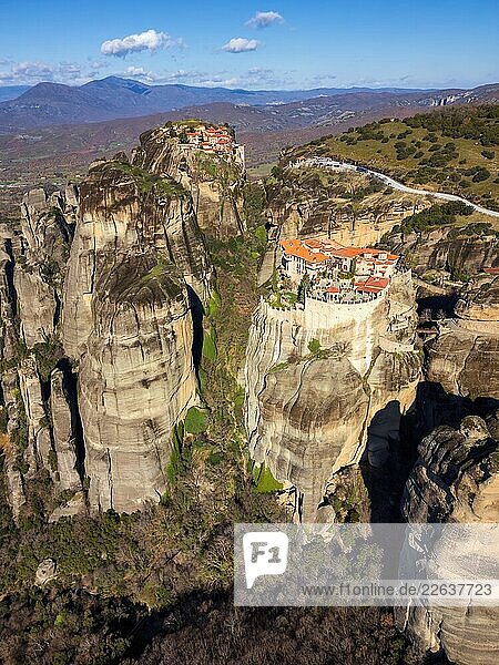 Drone aerial view of Meteora with ancient holy Monastery of Varlaam and Great Meteoron  UNESCO  Kalabaka  Greece