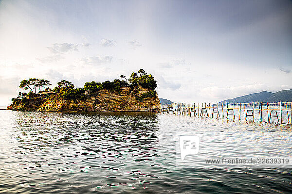 Wooden footbridge leading to the small island of Agios Sostis on Zakynthos  Greek Islands  Greece