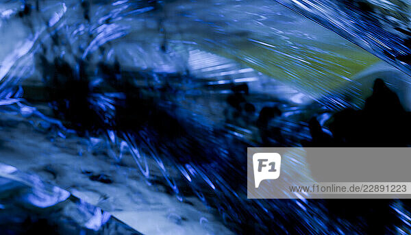 Abstract blue patterns with dynamic  wavy textures and light reflections. Blender 3D illustration