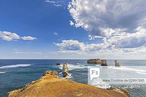 Australia  Victoria  Summer clouds over coastal landscape of Bay of Islands
