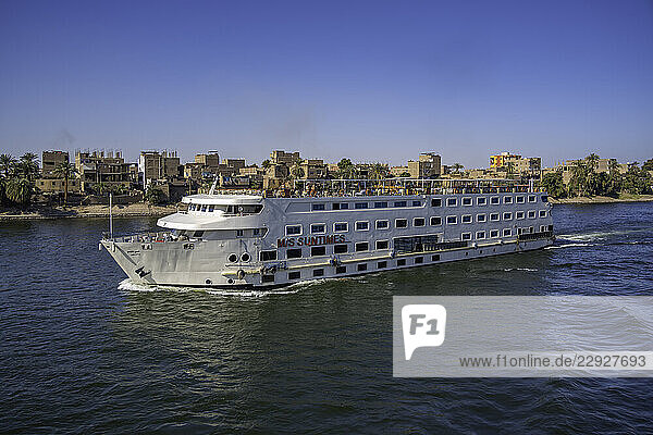 View of cruise boat from cruise boat near Armant on the Nile River  Luxor  Egypt  Africa