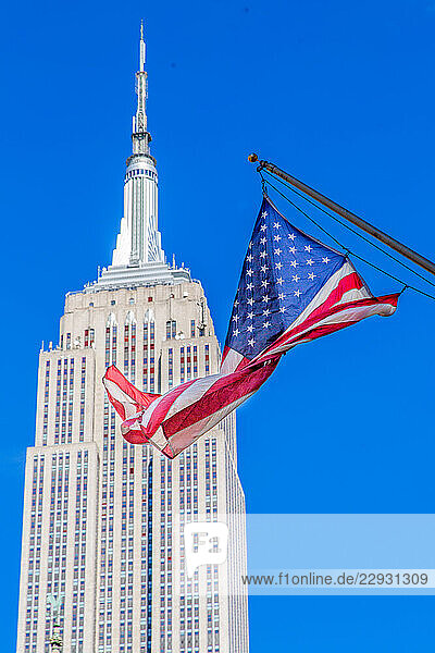 The Empire State Building in the Midtown South District  Manhattan  New York City. It was completed in 1931 and is 1 454 feet tall. The world s tallest building when built  it is now only the 59th.