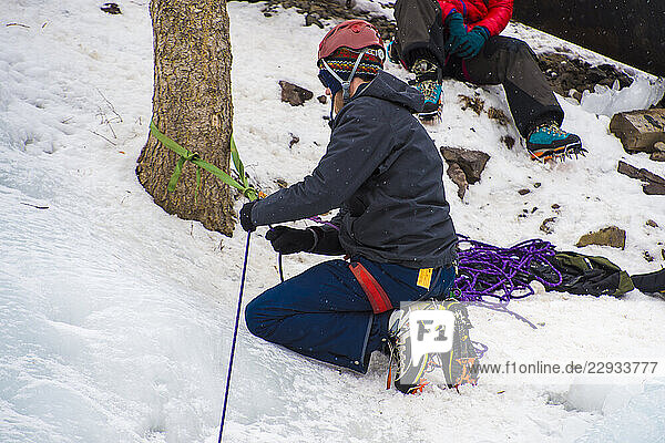 Climber setting up rope  Colorado  USA