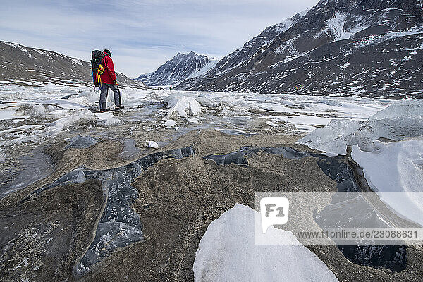 A scientist walks over Lake Hoare Antarctica.
