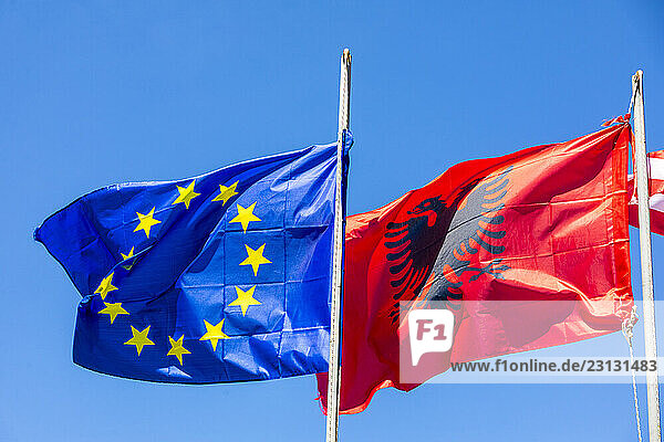 European flag and Albanian flag with double-headed eagle