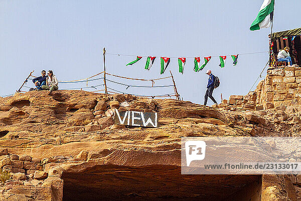 Jordan  Petra. Tourist at the site of a panoramic view of Petra.